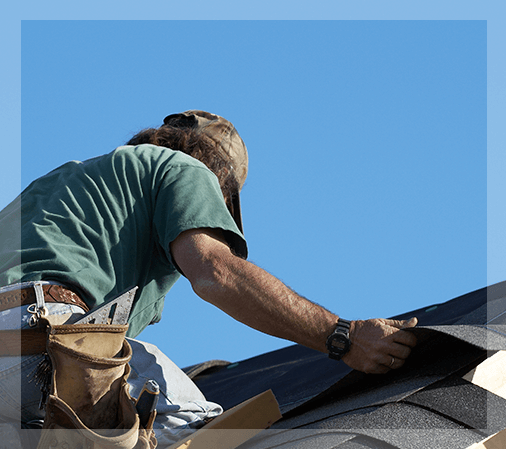 man installing roof